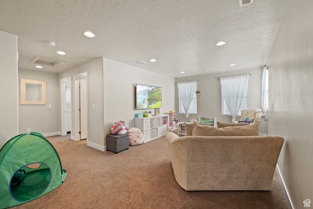 6443 W Early Bird Dr, South Jordan, UT 84009 - living area featuring attic access, carpet, baseboards, a textured ceiling, and recessed lighting
