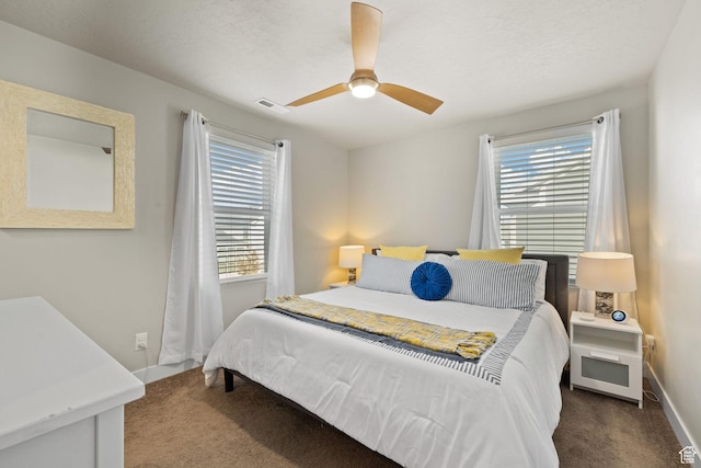 6443 W Early Bird Dr, South Jordan, UT 84009 - bedroom with multiple windows, carpet, baseboards, and a ceiling fan