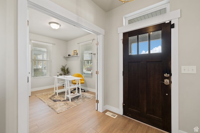 6443 W Early Bird Dr, South Jordan, UT 84009 - entryway with wood finished floors and baseboards
