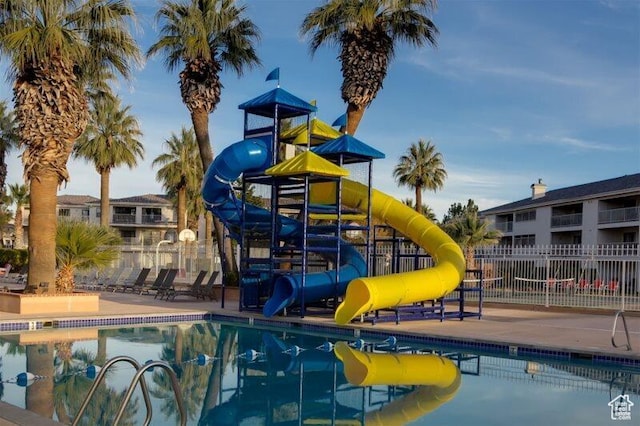 exterior space featuring a water slide and a patio