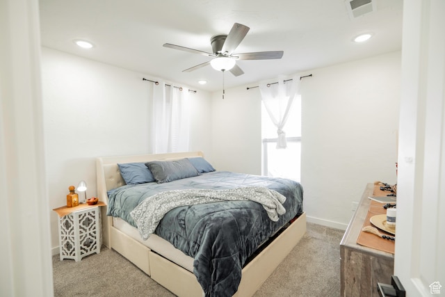 carpeted bedroom featuring ceiling fan