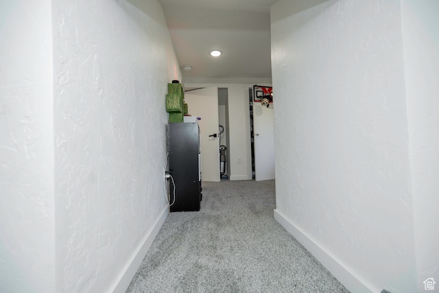 corridor with light carpet