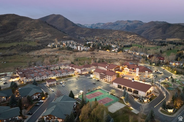 aerial view at dusk with a mountain view