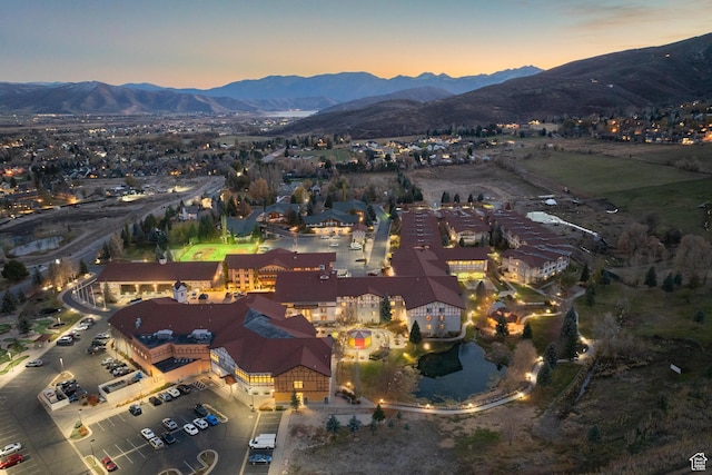 aerial view at dusk with a mountain view