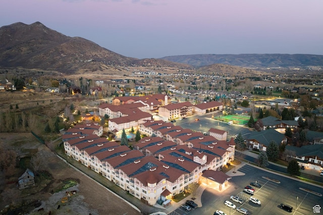 aerial view at dusk with a mountain view