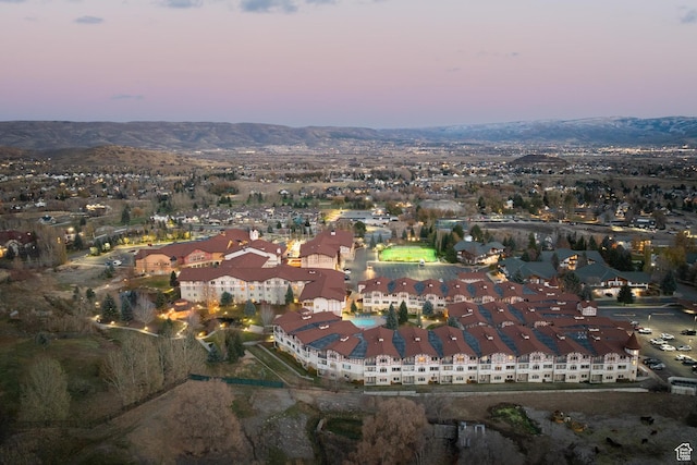 aerial view at dusk with a mountain view
