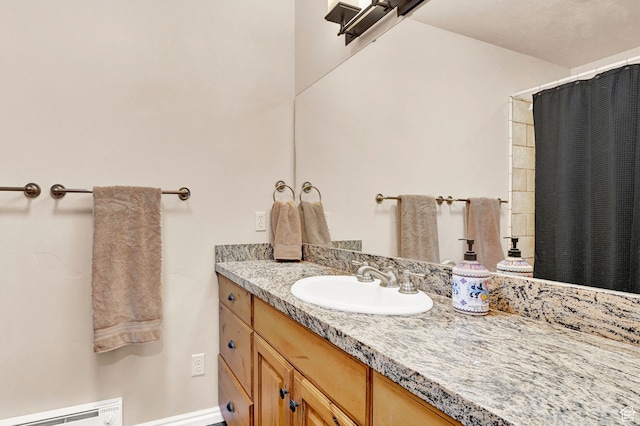 3521 N Fox Run Unit 811, Eden, UT 84310 - bathroom with vanity, baseboard heating, and curtained shower