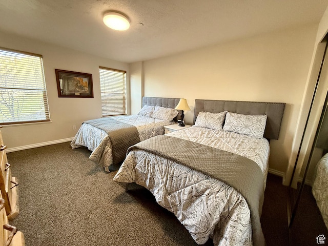 3521 N Fox Run Unit 811, Eden, UT 84310 - bedroom with carpet floors, multiple windows, and baseboards