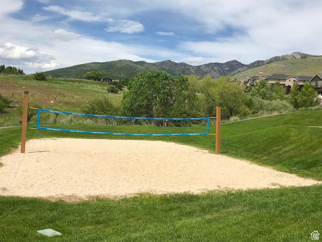 3521 N Fox Run Unit 811, Eden, UT 84310 - view of community with a mountain view, a lawn, and volleyball court
