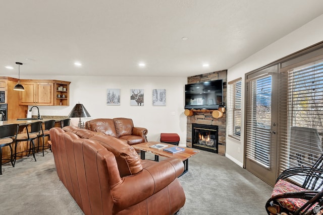 3521 N Fox Run Unit 811, Eden, UT 84310 - living room featuring light carpet, recessed lighting, and a stone fireplace