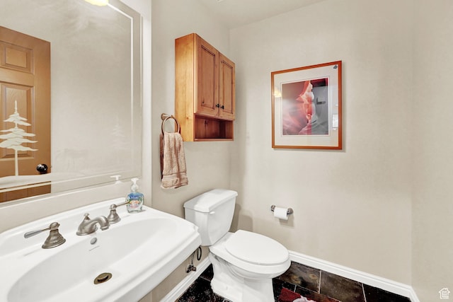 3521 N Fox Run Unit 811, Eden, UT 84310 - half bathroom with a sink, baseboards, and toilet