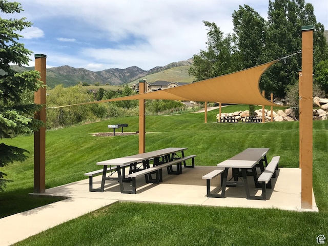 3521 N Fox Run Unit 811, Eden, UT 84310 - view of home's community with a mountain view, a yard, a patio area, and outdoor dining space