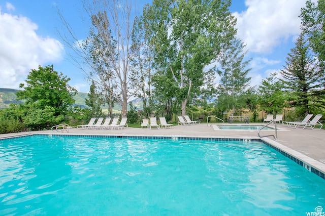 3521 N Fox Run Unit 811, Eden, UT 84310 - community pool with a patio and a mountain view