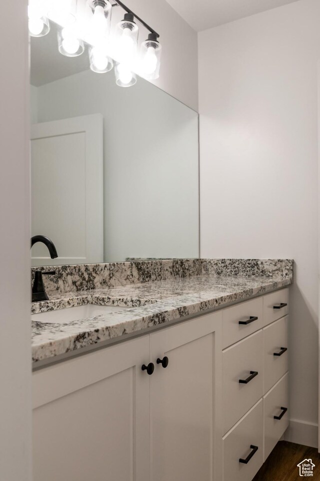 1342 N 4075 W Unit 3A, Vernal, UT 84078 - bathroom with vanity and wood finished floors