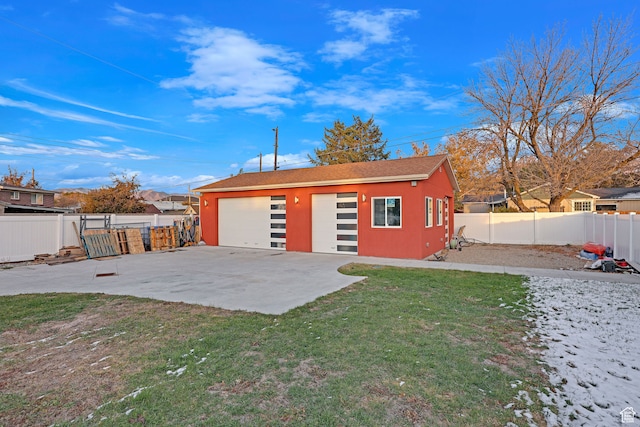 4325 S Park St E, Murray, UT 84107 - garage featuring a lawn
