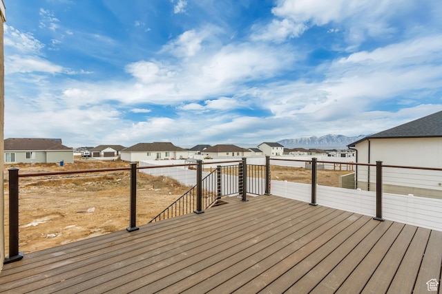 408 Rigdon St, Grantsville, UT 84029 - wooden terrace featuring a mountain view and a residential view