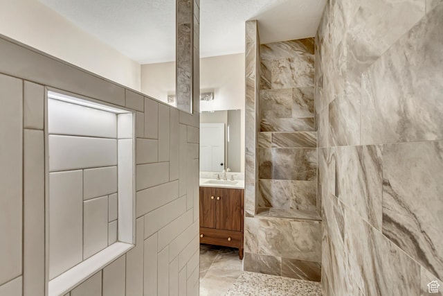 408 Rigdon St, Grantsville, UT 84029 - bathroom featuring vanity, a walk in shower, and tile walls
