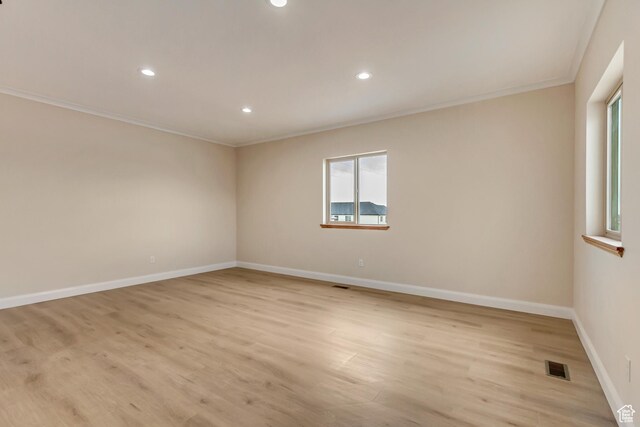 408 Rigdon St, Grantsville, UT 84029 - empty room with crown molding, light wood-style flooring, baseboards, and recessed lighting