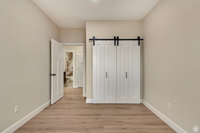 408 Rigdon St, Grantsville, UT 84029 - unfurnished bedroom featuring baseboards and light wood-type flooring