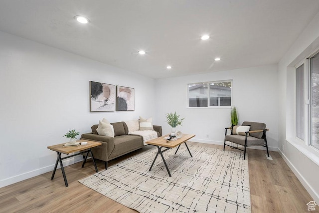1837 N 440 W, Layton, UT 84041 - living room with light wood finished floors, recessed lighting, and baseboards