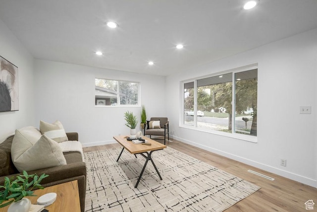 1837 N 440 W, Layton, UT 84041 - living area with light wood-type flooring, recessed lighting, and baseboards