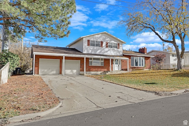 4866 Adams Ave, South Ogden, UT 84403 - view of property with a front yard and a garage