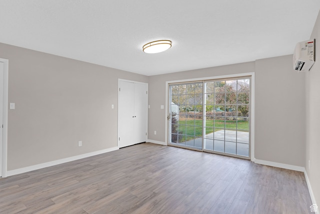 4866 Adams Ave, South Ogden, UT 84403 - spare room featuring a textured ceiling and light wood-type flooring