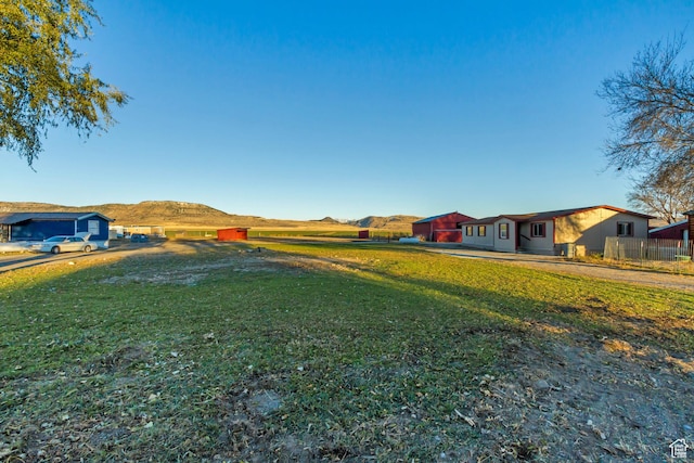 18120 N 4400 W, Fielding, UT 84311 - view of green lawn with a mountain view