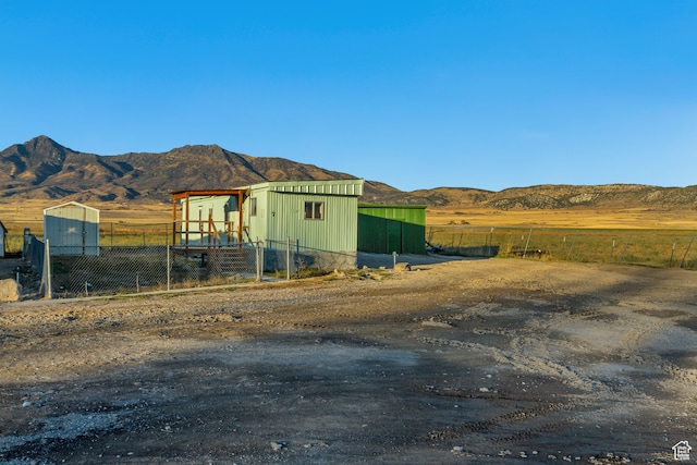 exterior space featuring a mountain view and a rural view