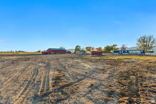 18250 N 4400 W, Fielding, UT 84311 - view of yard with an outbuilding and a view of rural / pastoral area
