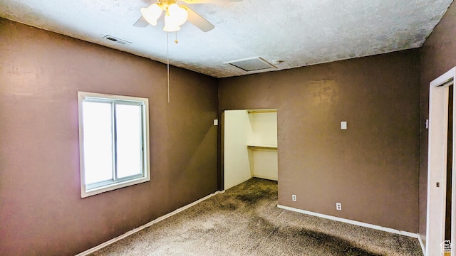 18250 N 4400 W, Fielding, UT 84311 - unfurnished bedroom featuring multiple windows, attic access, carpet, and ceiling fan