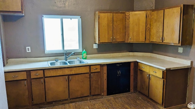 18250 N 4400 W, Fielding, UT 84311 - kitchen with a sink, light countertops, and dark wood finished floors