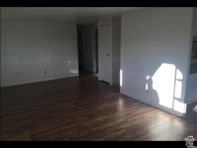 18250 N 4400 W, Fielding, UT 84311 - spare room featuring dark wood finished floors