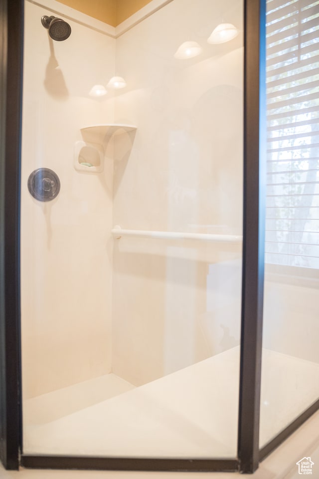 bathroom featuring walk in shower