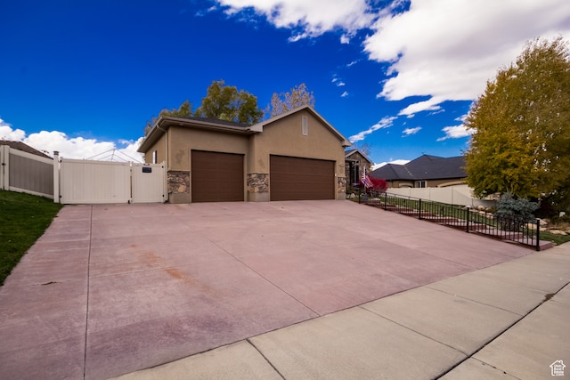 view of side of property with a garage