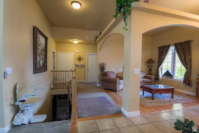 1126 S Valley View Dr W, Santaquin, UT 84655 - entryway with arched walkways, tile patterned floors, and baseboards