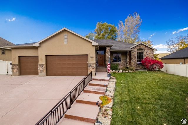 ranch-style home with a front lawn and a garage