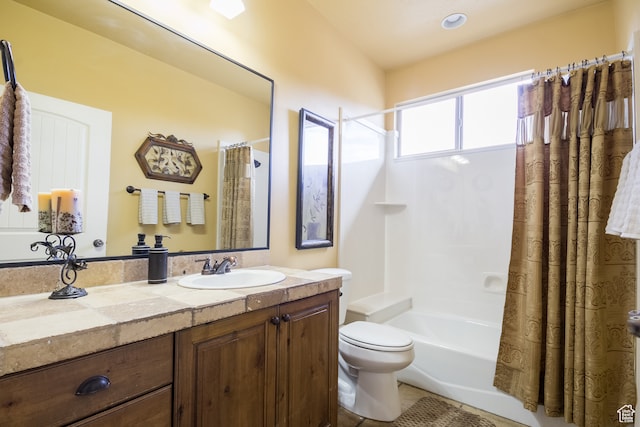 full bathroom featuring shower / tub combo, vanity, toilet, and tile patterned floors