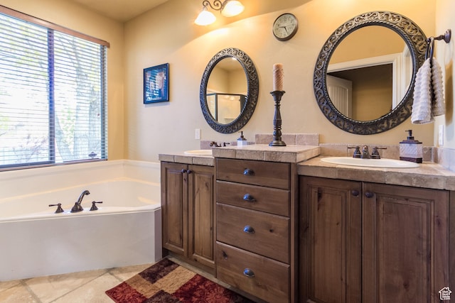 1126 S Valley View Dr W, Santaquin, UT 84655 - full bath with double vanity, plenty of natural light, a bath, and tile patterned floors