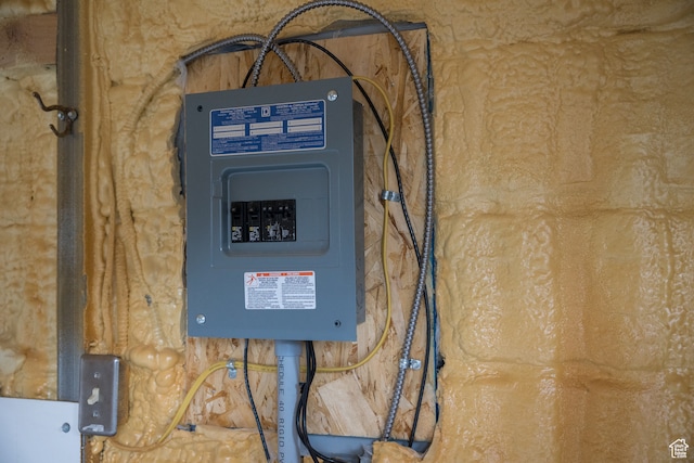 utility room featuring electric panel