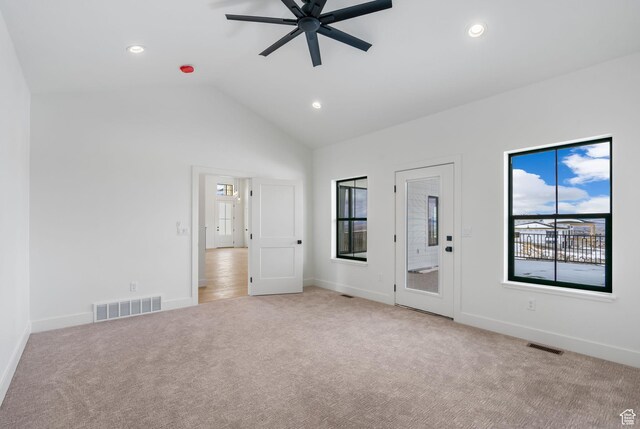 unfurnished bedroom featuring access to outside, recessed lighting, light colored carpet, and visible vents