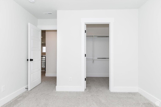 615 N 750 E, Hyde Park, UT 84318 - unfurnished bedroom featuring carpet floors, a spacious closet, and baseboards