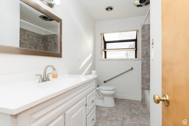 176 W 500 N, Malad City, ID 83252 - bathroom featuring vanity, toilet, tile patterned flooring, and bathtub / shower combination