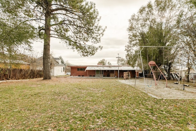 view of yard with a playground