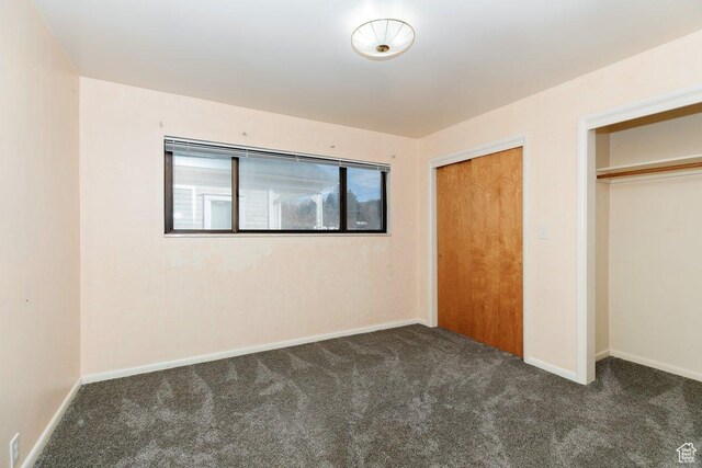 176 W 500 N, Malad City, ID 83252 - unfurnished bedroom with carpet floors, baseboards, and a closet