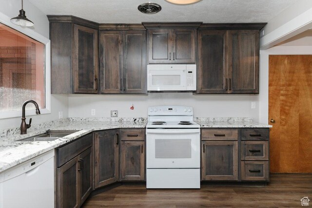 176 W 500 N, Malad City, ID 83252 - kitchen featuring white appliances, a sink, dark brown cabinetry, and dark wood-style flooring
