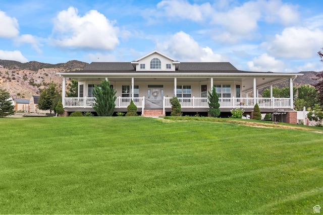 528 E 700 S Unit 4, Monroe, UT 84754 - farmhouse inspired home with a front lawn, a mountain view, and roof with shingles