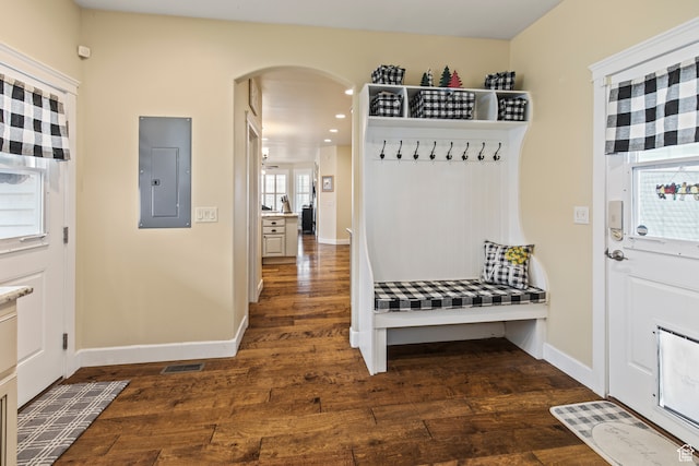 mudroom with electric panel and dark hardwood / wood-style floors