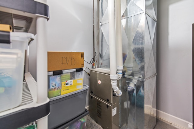 528 E 700 S Unit 4, Monroe, UT 84754 - utility room featuring heating unit