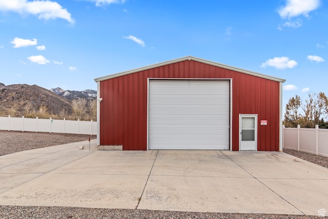 garage featuring a mountain view